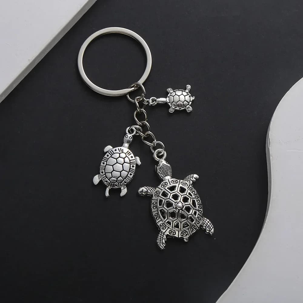Porte-clés tortue de mer mignon en métal, pendentif tortue creuse, porte-clés pour femmes et hommes,