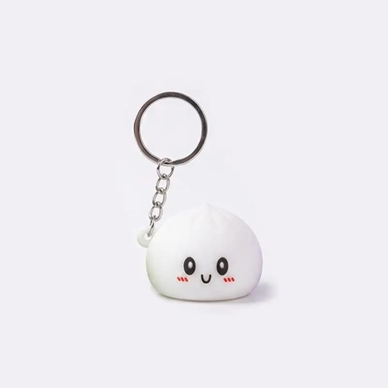 Porte-clés en silicone lumineux et adorable en forme de chignon, accessoire de dessin animé parfait 