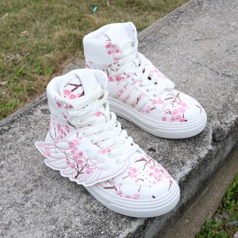 Baskets montantes tendance pour femme, style décontracté, avec talon épais à motif aile, grandes tai