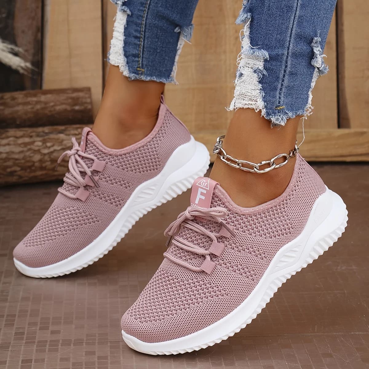 Chaussures de sport de loisirs pour femmes de couleurs unies avec tige en tricot et semelles souples