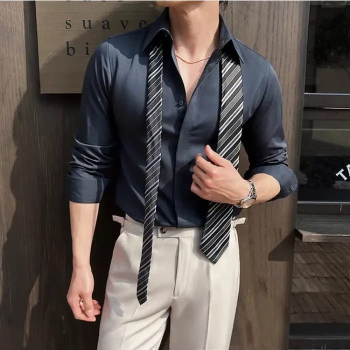 Chemise habillée blanche à manches longues pour hommes – Tissu mince et confortable. Idéal pour les événements formels et un usage quotidien. Design classique et moderne
