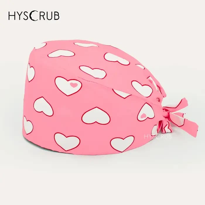 Casquette de gommage rose en forme de cœur