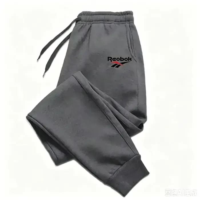 Pantalon de jogging décontracté pour homme, taille élastique avec cordon de serrage, poches latérales, coupe fuselée, chevilles resserrées, idéal pour la gym, la course et le fitness