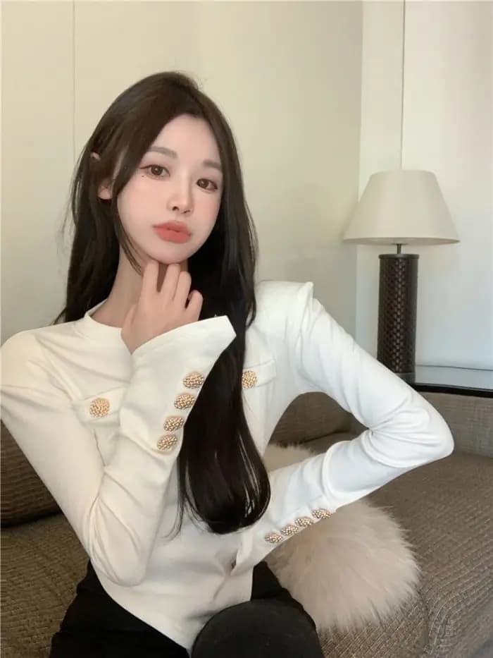 T-shirt blanc asymétrique à manches longues pour femmes