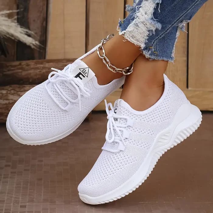 Chaussures de sport de loisirs pour femmes de couleurs unies avec tige en tricot et semelles souples pour la course à