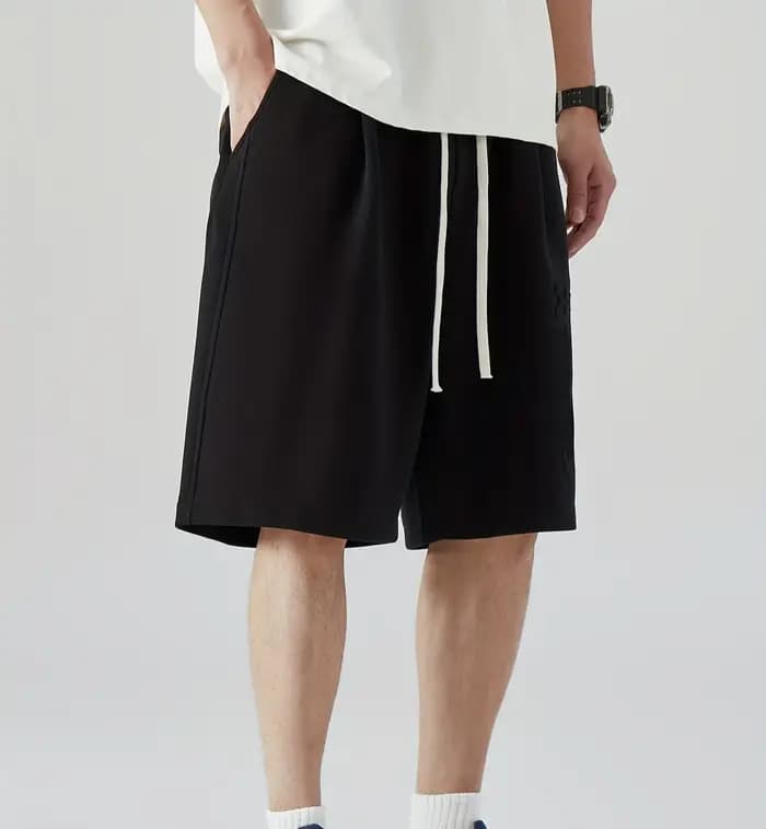 Pantalon unisexe ample style streetwear pour homme, longueur mi-cuisse, idéal pour le skateboard et