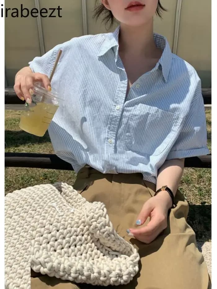 Chemise à rayures bleues manches courtes femmes été 2025 nouveau col Polo