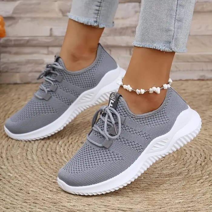Chaussures de sport de loisirs pour femmes de couleurs unies avec tige en tricot et semelles souples pour la course à