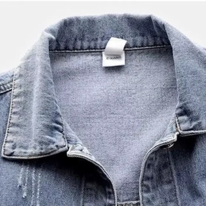 Manteau court en jean effiloché pour femme