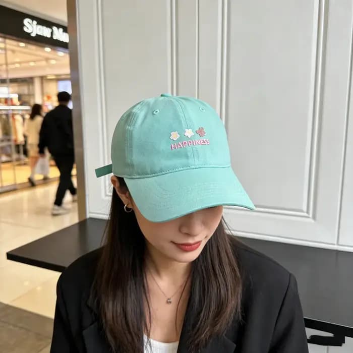 Casquette de baseball couleur macaron avec petite broderie florale