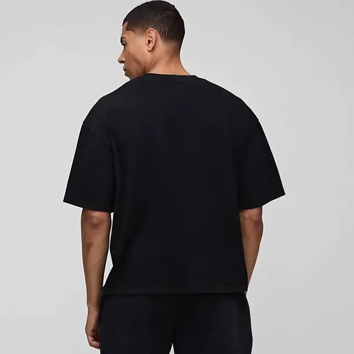 Surdimensionné Boxy abandonné demi manches poids lourd sport T-Shirts épaules hommes course