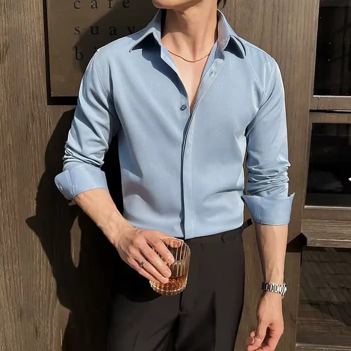 Chemise habillée blanche à manches longues pour hommes – Tissu mince et confortable. Idéal pour les événements formels et un usage quotidien. Design classique et moderne