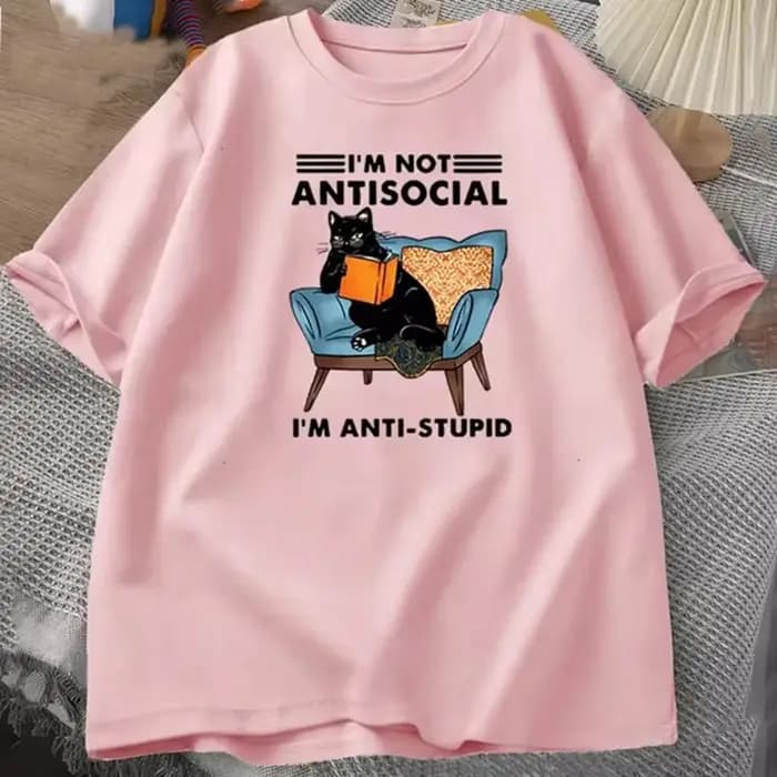 Chat drôle livre de lecture T-Shirts graphiques