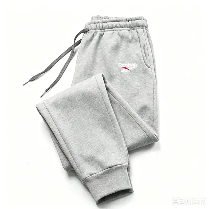 Pantalon de jogging décontracté pour homme, taille élastique avec cordon de serrage, poches latérales, coupe fuselée, chevilles resserrées, idéal pour la gym, la course et le fitness