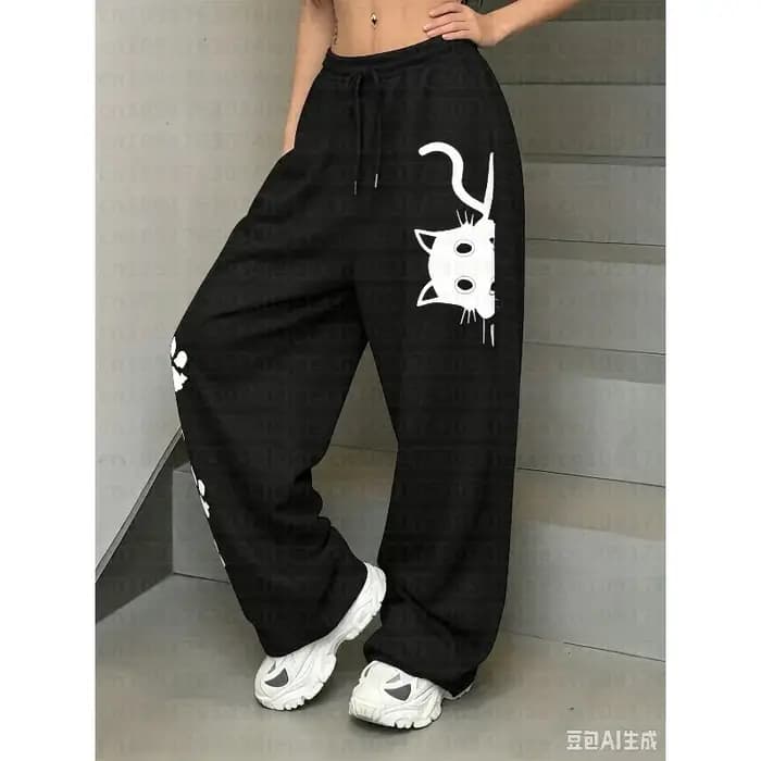 Pantalon de survêtement décontracté pour femmes et enfants avec un imprimé de chat amusant et une taille élastique à cordon de serrage, coupe droite.