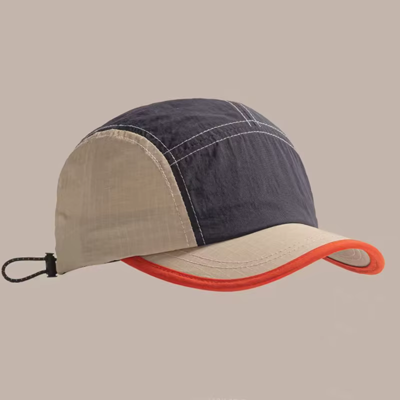 Une casquette à bord court pour hommes, nouveau style d'été, chapeau de baseball respirant et à séch