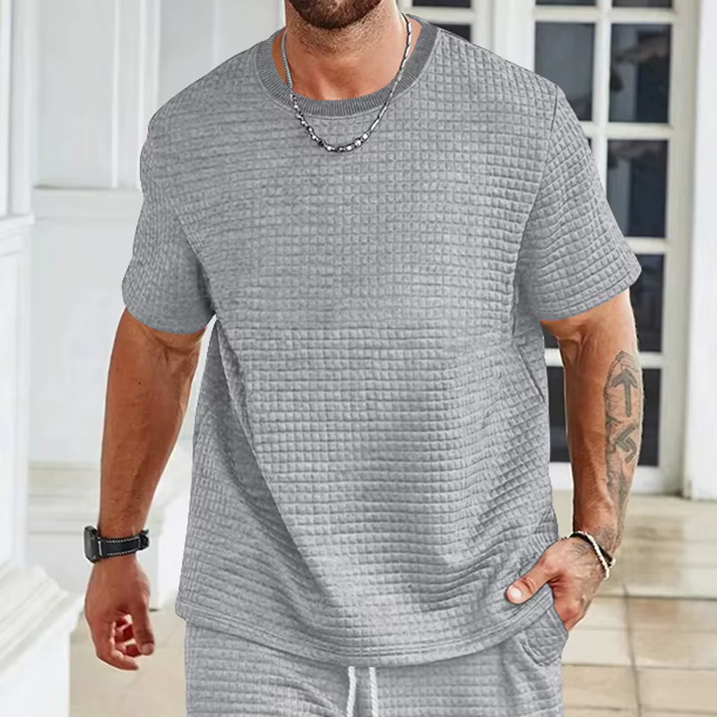 Nouveau T-shirt à manches courtes uni à col rond et petits carreaux pour homme, style sport et loisi