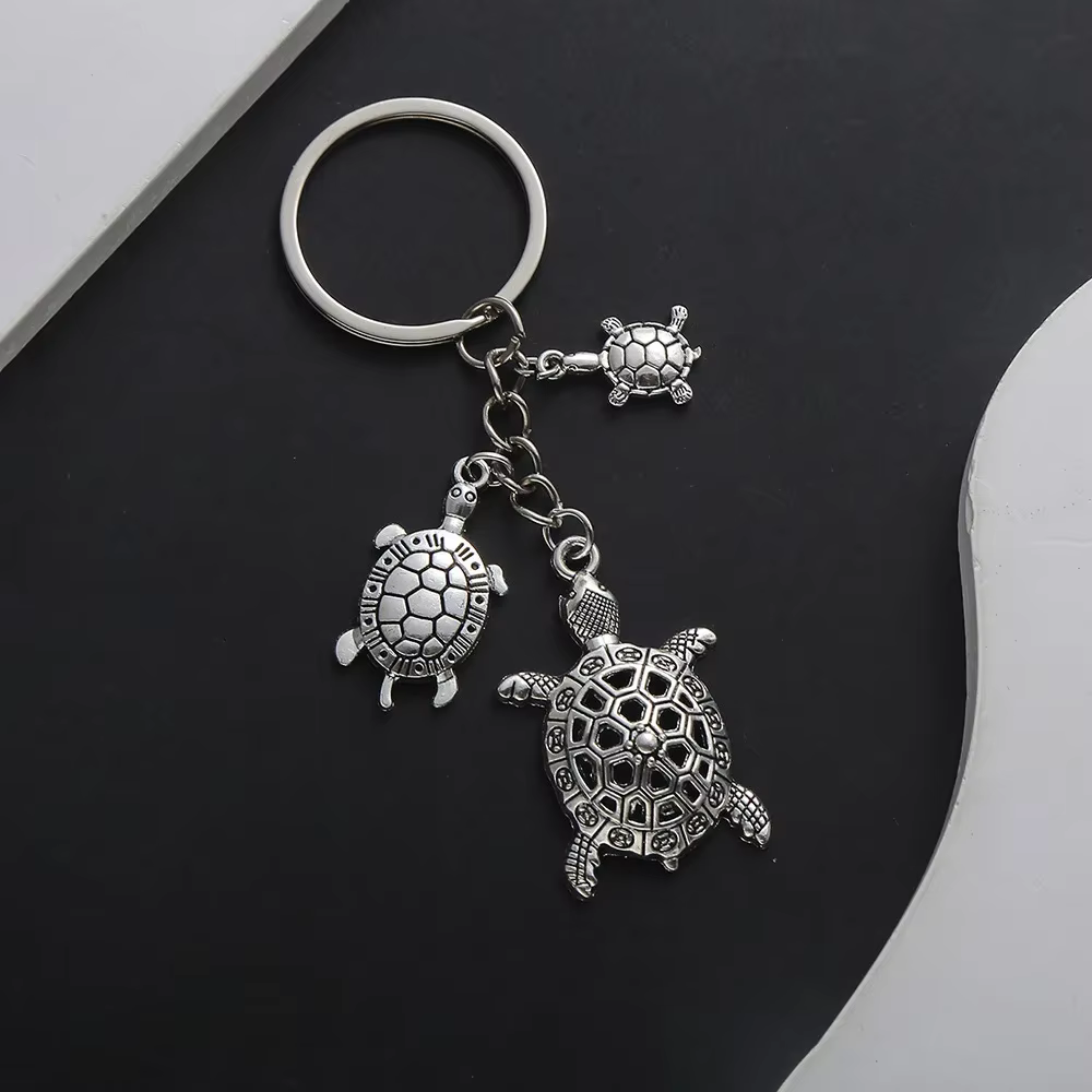 Porte-clés tortue de mer mignon en métal, pendentif tortue creuse, porte-clés pour femmes et hommes,